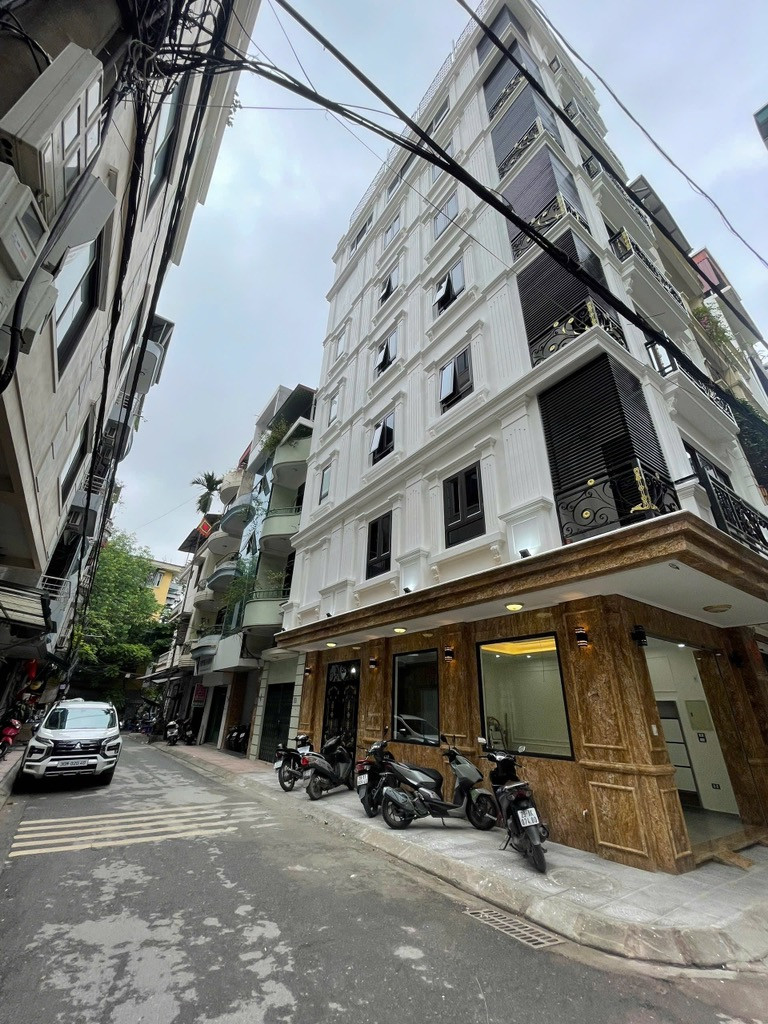 (Tin thật 100%) Bán nhà lô góc cao cấp xây mới 60m2 x 8T tại mặt phố Vĩnh Phúc - Phân lô ô tô tránh